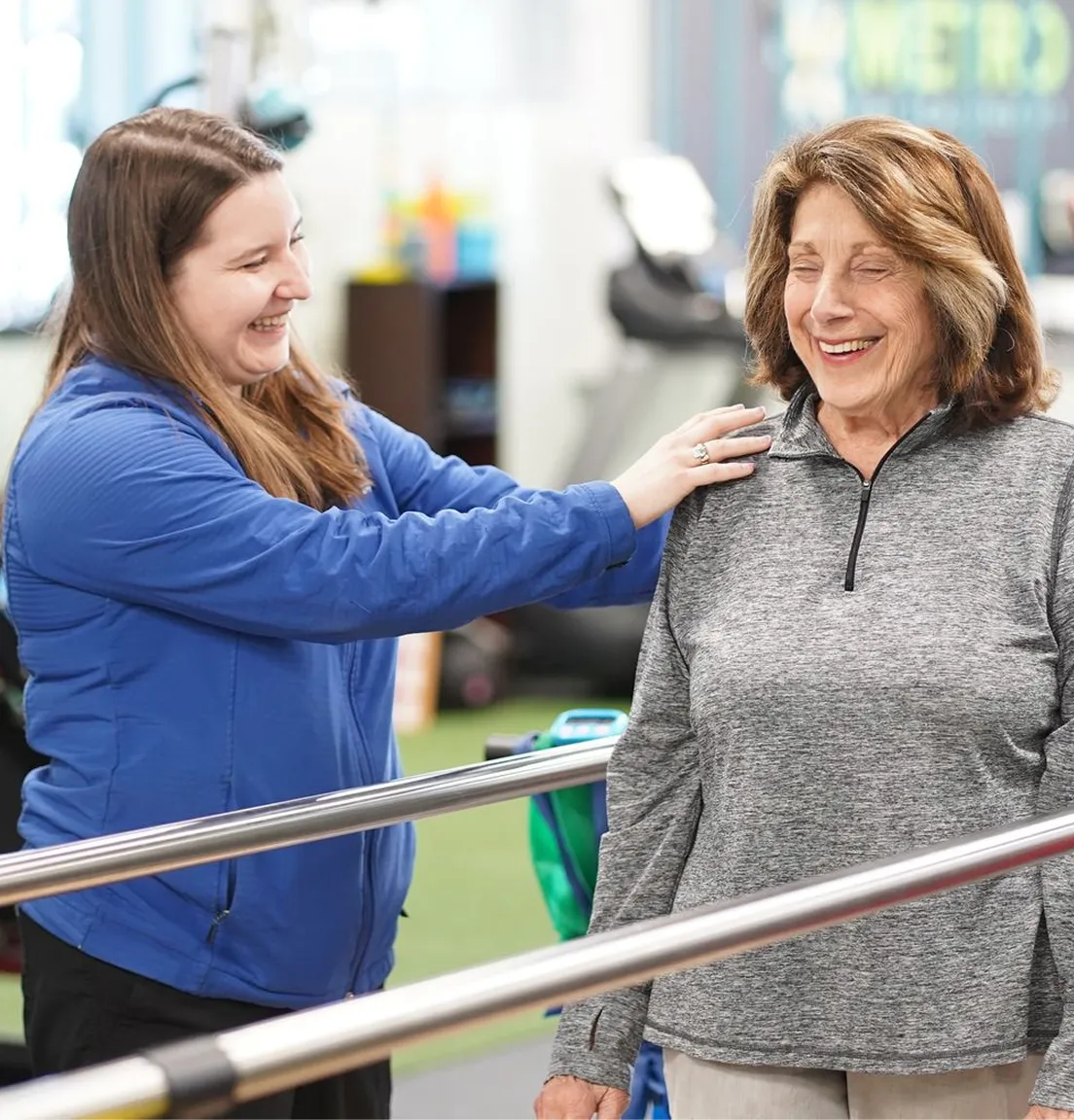 Therapist supporting a patient during a session